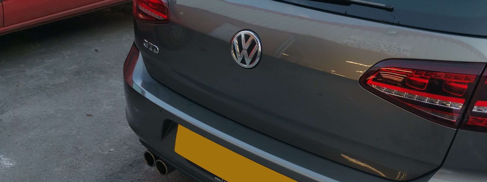 The rear of a grey Volkswagen Golf GTD repaired at Car Repair Business